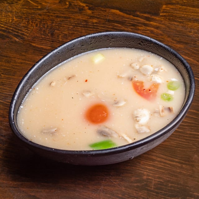 Tom Kha.